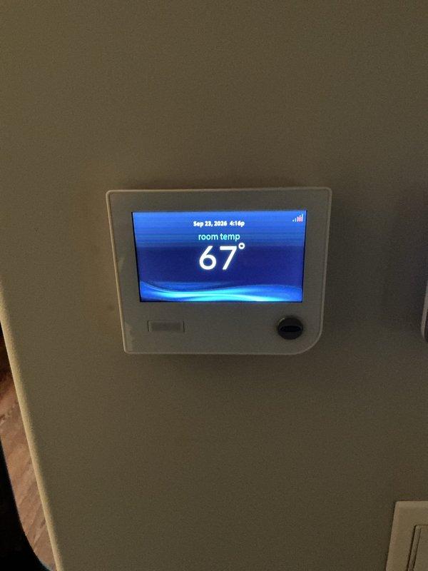 Responded to no heat call for second floor attic furnace displaying "Critical issue auxiliary input" error message. Upon inspection, diagnosed auxiliary input fault and cleared error code. Verified system operation, confirmed proper thermostat communication showing 67° room temperature, and inspected air filter condition which appeared serviceable. System restored to normal heating operation with all components functioning correctly.