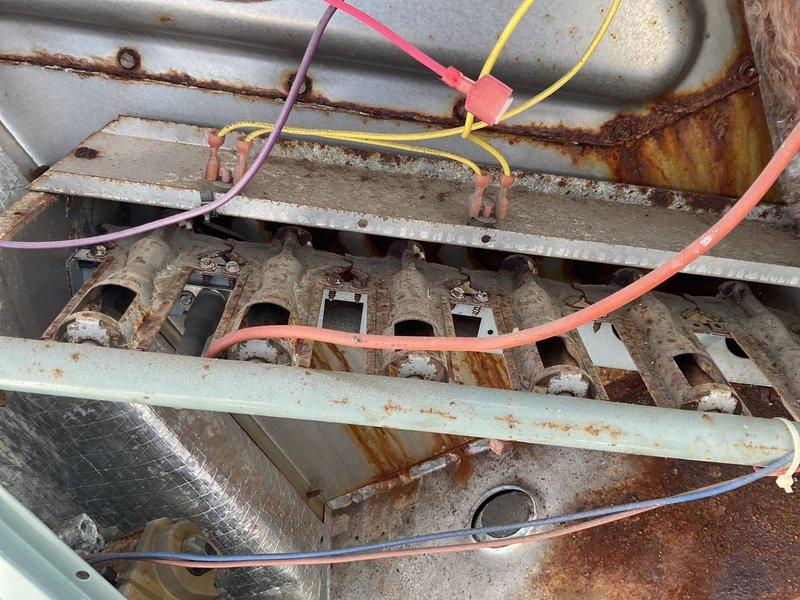 Completed comprehensive fall maintenance on 5 furnaces, 13 rooftop units, and 1 garage heater per annual agreement. Replaced 9 belts including AX38, AX40, AX43, BX66, AX49, and #35PAD sizes, and left 9 additional belts on-site for emergency use. Changed filters throughout facility: 12 units of 16x25x2, 3 units of 16x16x2, 1 unit of 24x24x2, and 2 units of 410 size. Performed visual inspections and documented equipment condition with photos, noting significant corrosion and rust on metal components requiring monitoring. Used borescope inspection camera to assess internal components and hard-to-reach areas of HVAC systems. All units operational upon completion of preventive maintenance service.