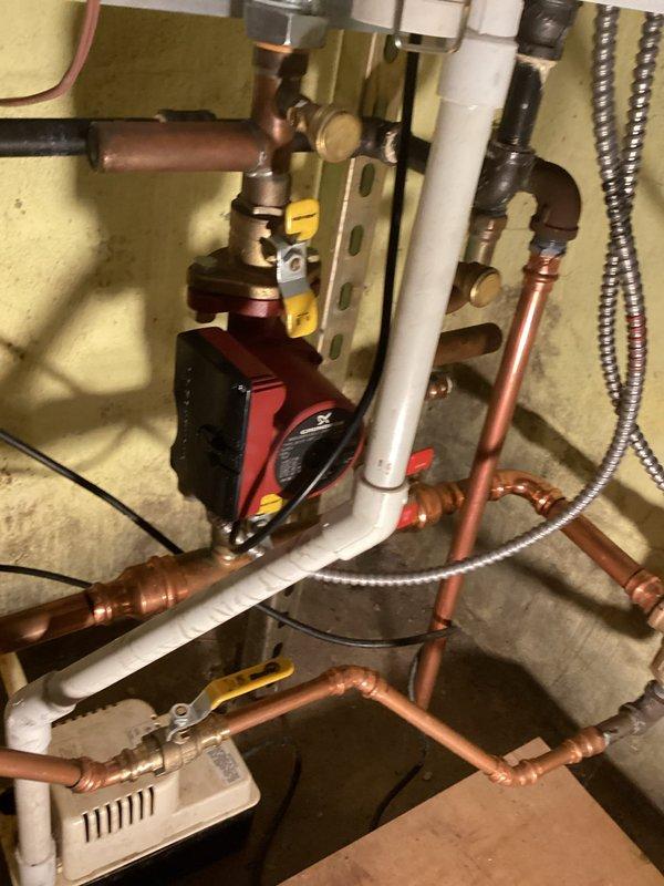 Completed comprehensive maintenance inspection on residential boiler system under maintenance agreement. Inspected circulator pump operation, verified proper function of all zone valves, and examined copper and PVC piping connections for leaks or deterioration. Checked condensate drainage system, inspected internal components including blower motor assembly and electrical connections, and documented system condition with photographic evidence. All components found operating within normal parameters with no immediate service needs identified.