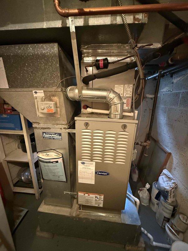 Completed comprehensive maintenance agreement service on dual furnace system, two humidifiers, and one tankless water heater. Performed thorough inspection and cleaning of both Carrier furnaces, including burner assemblies, heat exchangers, and blower components. Serviced both humidifier units, cleaning water panels and verifying proper water flow and drainage. Inspected tankless water heater for proper operation, checking venting, combustion, and flow rates. All equipment tested and confirmed operational within manufacturer specifications.