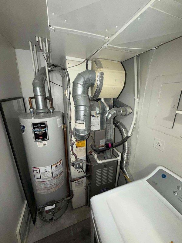 Completed comprehensive maintenance agreement service on residential HVAC system including one furnace and one humidifier unit. Performed thorough inspection of furnace assembly, evaporator coil, and associated components located in basement utility area. Verified proper operation of humidifier system, checked all electrical connections, inspected refrigerant lines and PVC condensate drainage, and confirmed adequate airflow through ductwork. All equipment found operating within manufacturer specifications with no immediate repairs required.