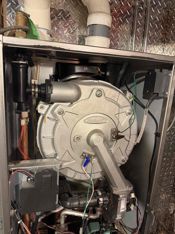 Replaced customer-provided circulator pump assembly under warranty coverage. The new Silentcore pump unit was installed within the hydronic heating system, with all copper refrigerant lines, PVC condensate drainage, electrical connections, and control wiring properly reconnected and secured. System valve assemblies and flexible connectors were verified for proper operation, and all mounting hardware was torqued to specification.