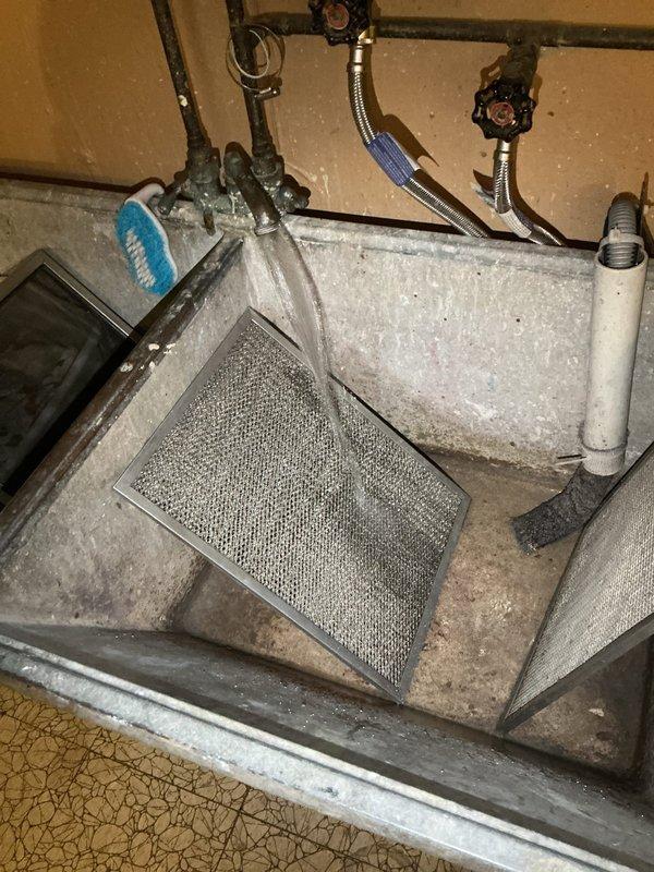 Performed comprehensive preventive maintenance on Carrier furnace and humidifier system under maintenance agreement. Inspected and replaced faulty flame sensor component, which showed signs of carbon buildup affecting ignition performance. Cleaned accumulated dust and debris from air filters and interior cabinet surfaces, removed and serviced mesh filters that exhibited significant dirt loading, and verified proper operation of gas valve connections and piping. Documented system condition through photographic records and confirmed all mechanical components, wiring connections, and safety controls functioning within manufacturer specifications upon completion.