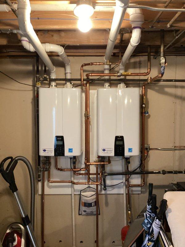 Completed courtesy check on two furnaces, two humidifiers, and two Navien tankless water heaters. Performed visual inspection of both wall-mounted Navien units, verified proper operation of digital control panels, and inspected copper piping connections for both systems. Conducted water quality testing on the tankless water heaters to ensure optimal performance and prevent scale buildup. All equipment operating within normal parameters with no issues identified at time of service.