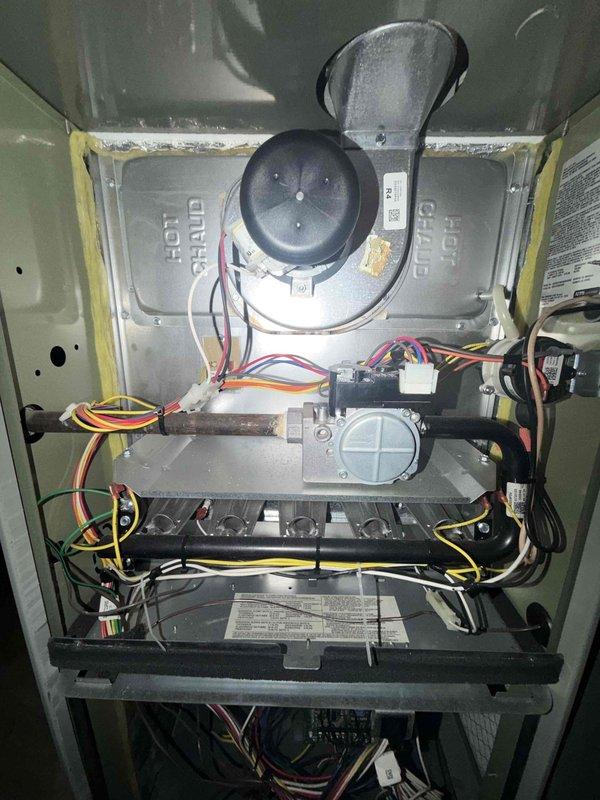Completed comprehensive winter maintenance tune-up on 9-year-old gas furnace, including full system inspection, cleaning of blower assembly and burner components, verification of gas valve operation, and testing of all safety controls. Replaced ceramic filter in whole-house humidifier system and confirmed proper humidifier function. All components operating within manufacturer specifications with no deficiencies noted.