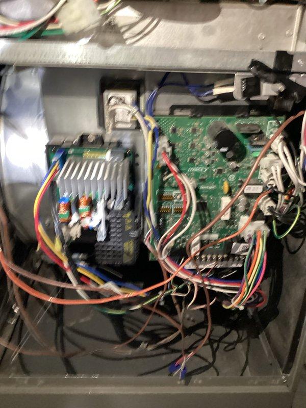 Returned to property to complete replacement of failed driver board as part of Customer of the Week warranty coverage. Successfully removed defective driver control module and installed new replacement unit. Verified all wire connections to circuit board were secure and properly seated. Tested system operation and confirmed heating system cycling properly with new driver board functioning as designed.