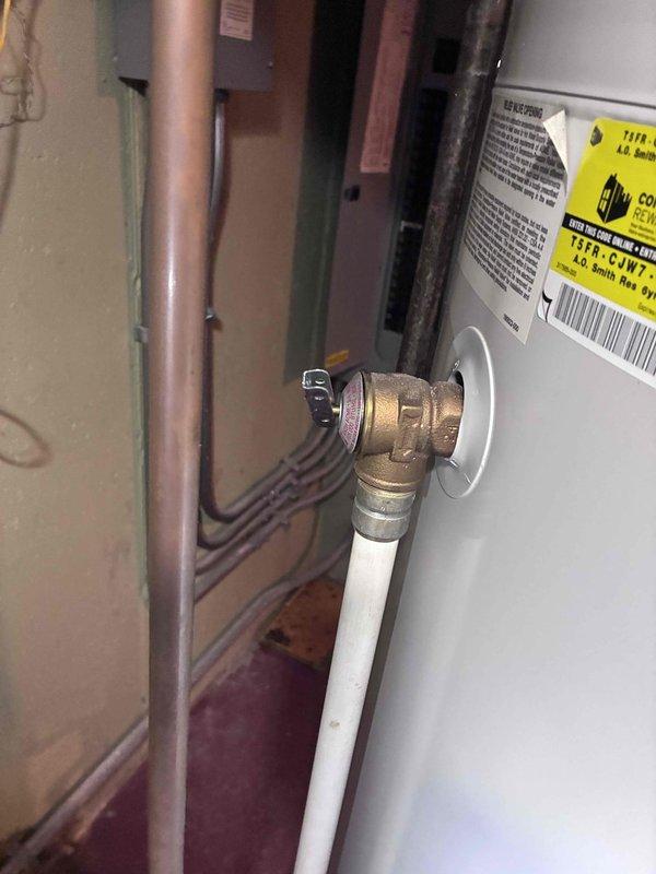 Completed comprehensive maintenance agreement inspection on residential HVAC system including two furnaces, one garage heater, two humidifiers, one media filter, and one electronic air cleaner. Performed routine maintenance checks on water heater, inspecting plumbing connections, brass fittings, and PEX supply lines for proper operation and potential leaks. All equipment photographed and documented for maintenance records, with all systems found to be operating within normal parameters.