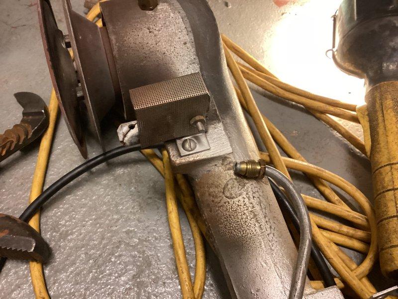 Completed scheduled maintenance agreement inspection on commercial boiler system. Documented existing motor assembly and associated components, including flexible gas lines, electrical connections, and ductwork assembly for maintenance records. All system components were photographed to establish baseline condition for future service reference.