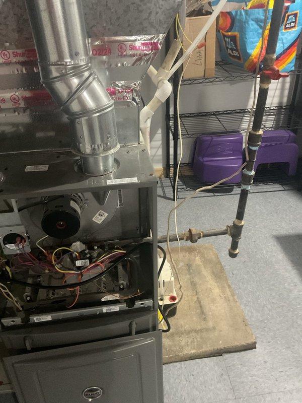 Responded to gas shut-off due to leak in dryer gas line. Performed pressure test on gas system using manometer gauge with 10-minute hold time to verify leak location and system integrity. Inspected HVAC equipment and gas piping connections in utility area to assess extent of leak and determine necessary repairs.