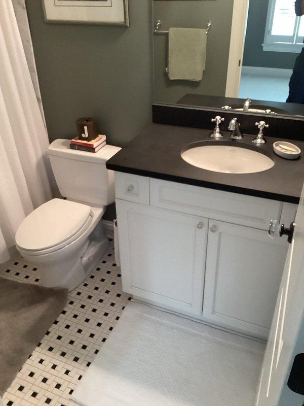 Completed comprehensive whole home plumbing inspection with primary focus on reported basement leak and bathroom faucet concerns. Thoroughly examined under-sink plumbing assembly including chrome drain assembly, PVC P-trap configuration, and copper supply lines with shut-off valves, confirming all connections were secure and functioning properly. Inspected bathroom fixtures, vanity plumbing, and surrounding areas for moisture intrusion, leaks, or potential issues requiring attention.