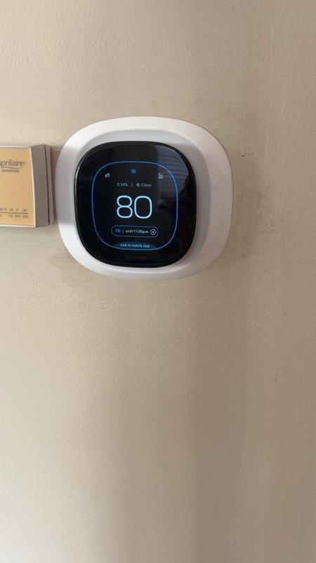 Completed full HVAC system replacement including furnace, air conditioning unit, evaporator coil, humidifier, and digital thermostat. System commissioning verified proper static pressure readings at 3.92" w.c., and new Aprilaire thermostat was programmed and tested for optimal climate control operation.