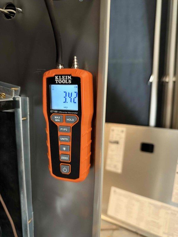 Completed full HVAC system replacement including furnace, air conditioning unit, evaporator coil, humidifier, and digital thermostat. System commissioning verified proper static pressure readings at 3.92" w.c., and new Aprilaire thermostat was programmed and tested for optimal climate control operation.