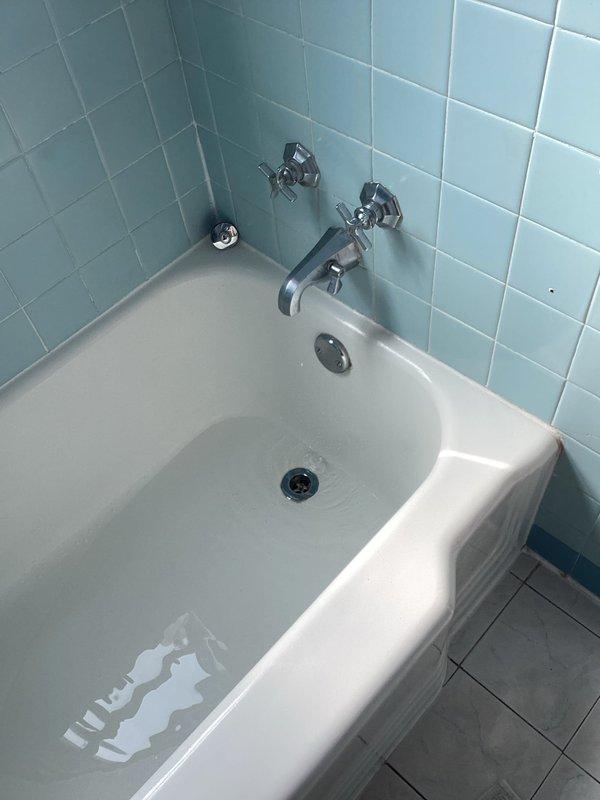 Diagnosed a toilet that was flushing poorly with water backing up through the basement floor drains, indicating a partial blockage in the main drain line. Cleared the obstruction to restore proper drainage, then tested the toilet and floor drains to confirm normal flushing with no further backup.