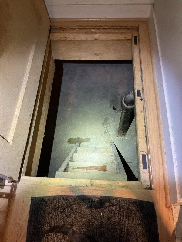 Performed scheduled maintenance on two furnaces and two whole-house humidifiers under the service agreement; media filters were excluded from scope. Inspected the basement mechanical space and crawl space access, and documented rust and corrosion on the ductwork above one humidifier along with moisture spotting on the unit housing, loose wiring with exposed connectors, and staining on the floor and access steps, which should be evaluated for possible water leakage or excess condensation.
