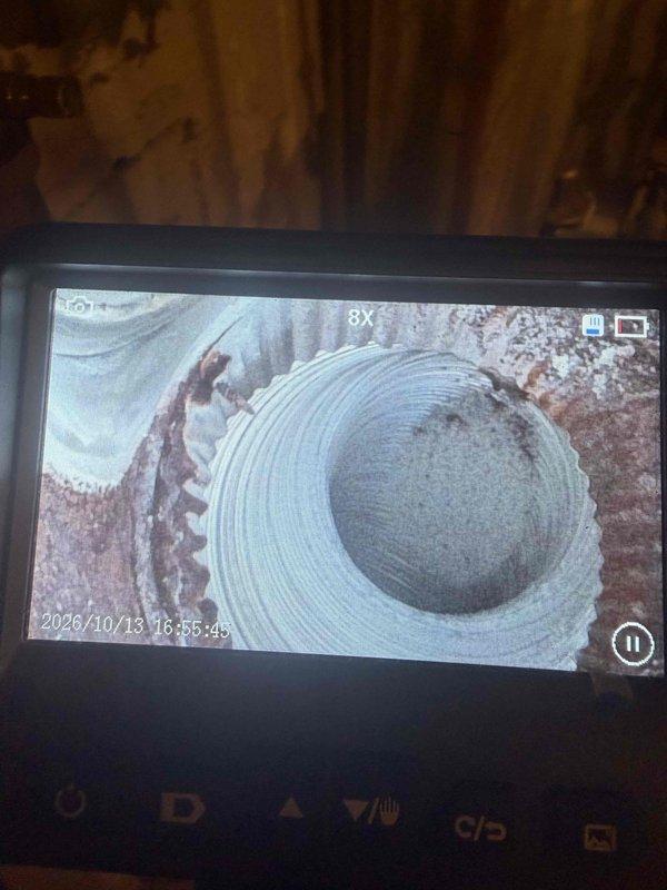 Performed maintenance inspection on a gas furnace approximately 12 years old, including a borescope inspection of the heat exchanger and flue passages, which revealed heavy rust, scale buildup, and corrosion along with debris accumulation. Found the heat exchanger severely deteriorated with multiple perforations and burn-through holes, along with brittle wiring and aged control components, creating a potential safety hazard. Documented findings with photographs and recommended furnace replacement.
