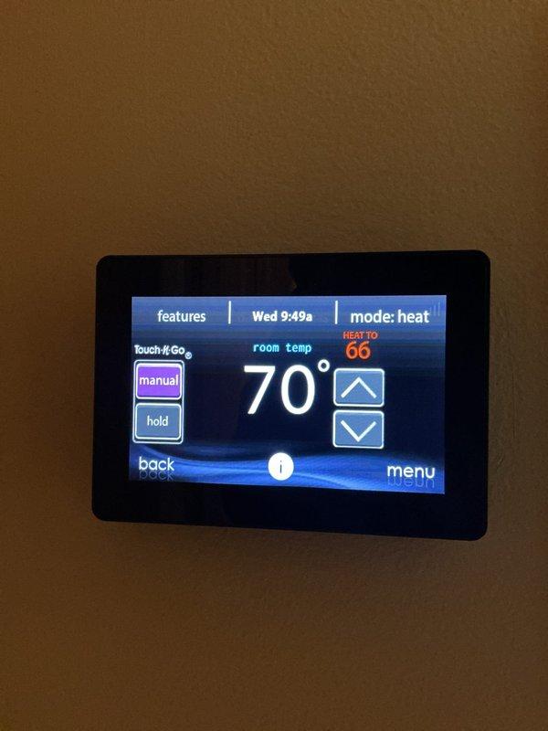 Performed scheduled maintenance on two gas furnaces and their associated humidifiers, including a complete cleaning and inspection of each system. Verified heating operation with the thermostat in heat mode, and confirmed supply air temperature at the ductwork with a digital thermometer. Ductwork was found clean and intact with no signs of frost, rust, or cracks, and both systems were left operating properly.
