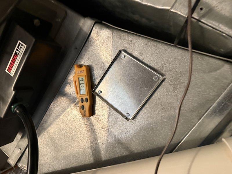 Performed scheduled maintenance on two furnaces and humidifiers, replacing 16x25x1 air filters and humidifier water panels (990-13 and #35 models) and verifying proper operation. Inspected burner assemblies, confirming stable blue flame, and checked the gas valve, draft inducer, pressure switch, and wiring connections with no rust, frost, or damage found. Took measurements at the plenum access panel to confirm system performance.