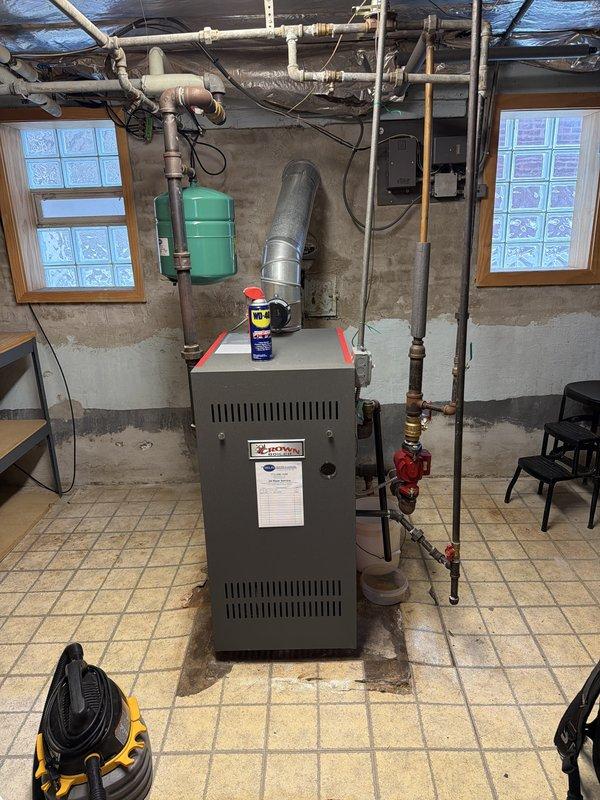Performed annual maintenance on the boiler under the customer's service agreement, including inspection of the unit, venting, expansion tank, and associated piping and valves. Verified thermostat operation, confirming the system responds to a call for heat and runs properly in Heat mode. Noted that the customer will be renewing the annual maintenance agreement.
