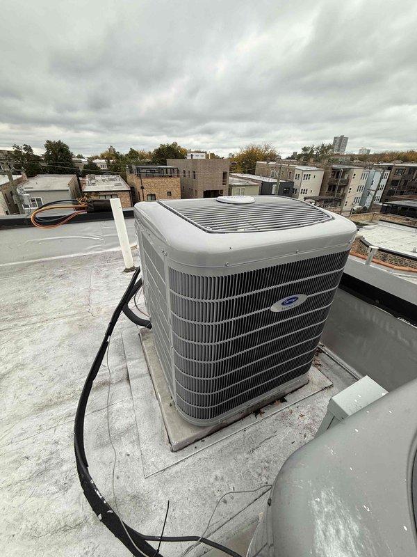 Completed a full HVAC system changeout, replacing the furnace, condenser, evaporator coil, humidifier, and thermostat with a two-person crew in one day. The new rooftop condenser was set on a level pad and connected to the existing refrigerant line set, electrical disconnect, and flexible conduit, with the indoor components installed and integrated to operate as a matched system.