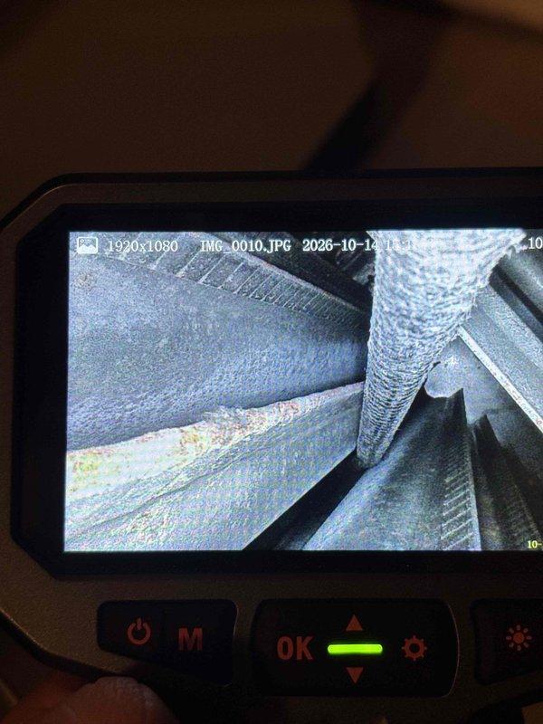 Performed a seasonal heating tune-up on a 9-year-old furnace, including inspection of the burner assembly, gas valve, blower motor, and electrical connections, with amperage measured on the control circuit using a clamp meter. Used a borescope to visually inspect the internal cabinet and ductwork, noting minor reddish-orange discoloration consistent with surface rust but no obvious damage. Equipment was found operating within normal parameters and ready for the heating season.