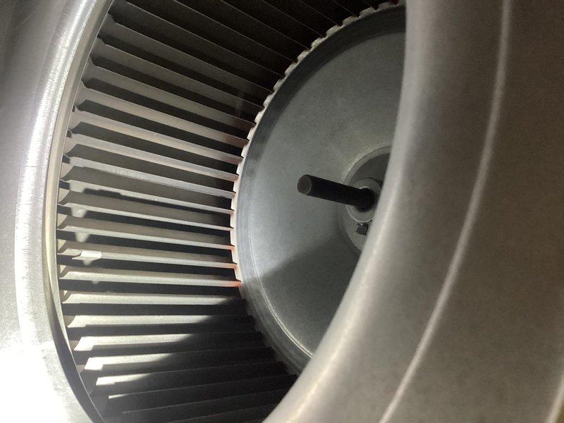 Performed scheduled maintenance on the gas furnace, replacing the 24x24x1 return air filter and inspecting the blower assembly, where the squirrel-cage wheel, motor shaft, and housing were found clean with no rust, frost, or debris buildup. Verified the condensate drain line (PVC) was properly routed and checked the condensate safety switch, which showed normal operation with the green indicator illuminated.