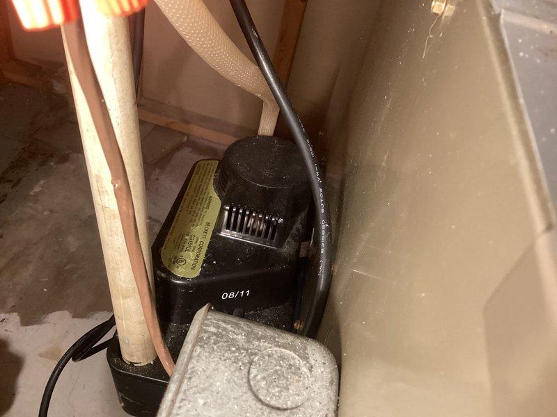 Performed scheduled maintenance on the furnace as part of the HVAC maintenance agreement, including inspection and cleaning of the blower assembly and housing, which showed no signs of rust, frost, or damage. Inspected the condensate pump installation, confirming the unit and its associated drain line, power cord, and wiring were intact and in serviceable condition. The system was left operating normally.