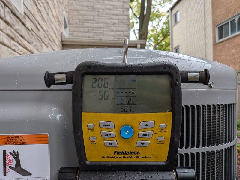 Replaced the furnace, condenser, evaporator coil, and thermostat as a complete system changeout. Evacuated the system to 206 microns to verify a dry, leak-free circuit before releasing refrigerant, and configured the new communicating thermostat with the line set parameters (3/8" liquid line, 3/4" vapor line, 15 ft length) to ensure proper system setup and operation.