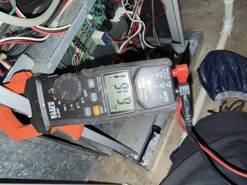 Performed annual preventive maintenance on one furnace, including inspection of the blower assembly and wheel, which was found free of damage, rust, or significant debris. Conducted electrical diagnostics with a digital clamp meter at the control board and low-voltage wiring to verify system operation. Noted that the flame sensor (Reme bulb) is due for replacement and recommended further thermostat diagnostics if control issues persist.