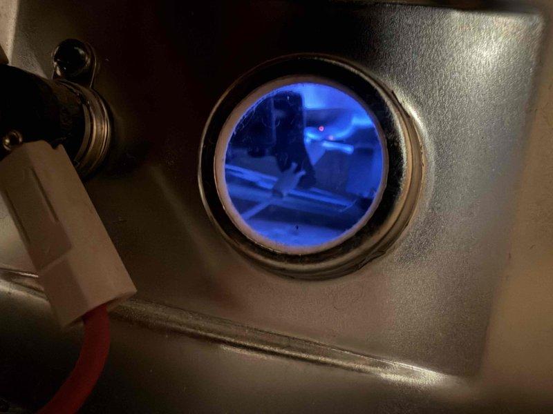 Performed seasonal maintenance on one furnace, one humidifier, and one gas water heater under the maintenance agreement. Inspected the furnace burner flame through the sight glass and confirmed a stable blue flame, and serviced the humidifier. Inspected the water heater and noted rust, discoloration, and debris at the burner access area, recommending monitoring and further cleaning or evaluation as needed.
