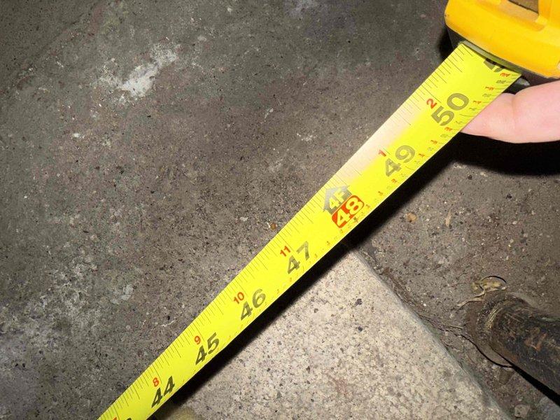 Performed on-site evaluation of a 30+ year-old steam boiler system in a condominium mechanical room for full replacement. Documented the existing boiler, controls, gauges, and heavily oxidized iron piping and fittings, and took clearance measurements of the mechanical space to support equipment sizing and replacement planning.