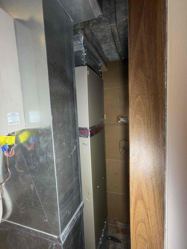 Removed the existing furnace and installed a new Carrier upright gas furnace, connecting it to the existing supply plenum and galvanized ductwork, flue venting, PVC condensate drain, and electrical supply with a properly secured junction box. Sealed duct connections, verified system operation, and left the equipment area clean with no visible damage or leaks.