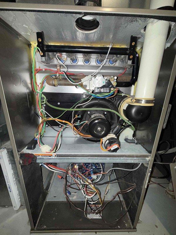 Performed scheduled maintenance on the gas furnace and water heater, including a visual inspection of the furnace burner assembly, inducer motor, PVC vent connections, gas valve, pressure switch, and control board wiring, with no signs of frost, rust, or damage observed. Used a borescope to inspect the flue/vent passage and replaced the 16x25x1 air filter to maintain proper airflow.