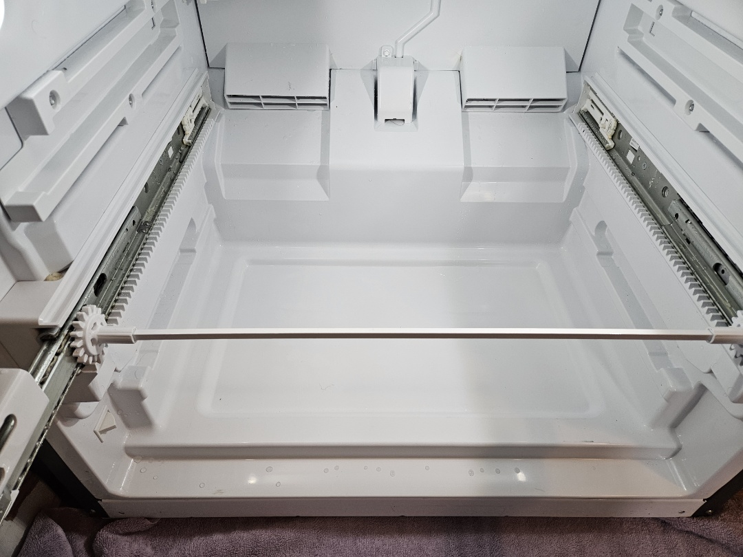 One of the down sides to a bottom-freezer fridge, is the inability to see if any food items have shifted to someplace that prevents proper appliance operation. 