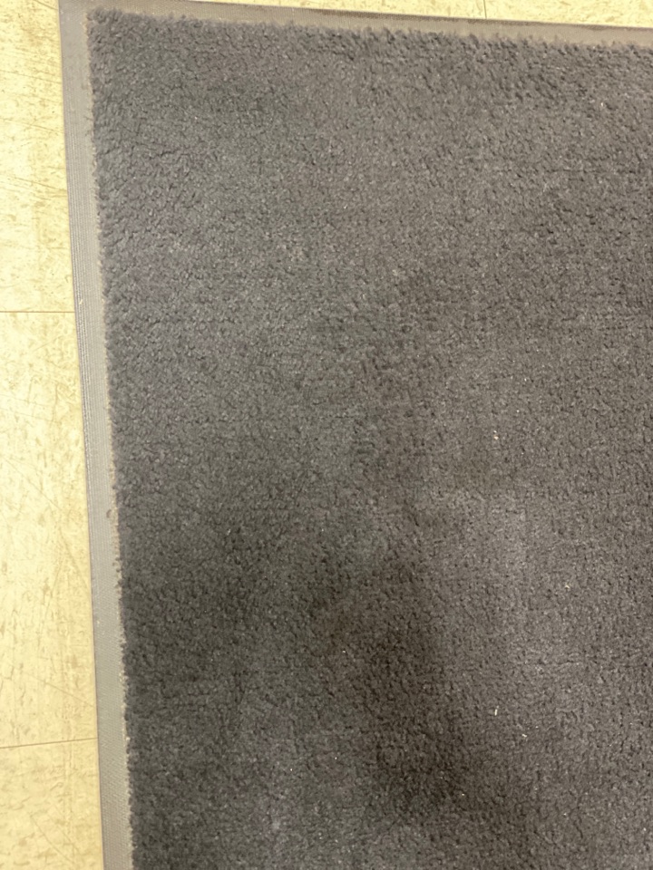 Vacuuming rug Vacuuming rug