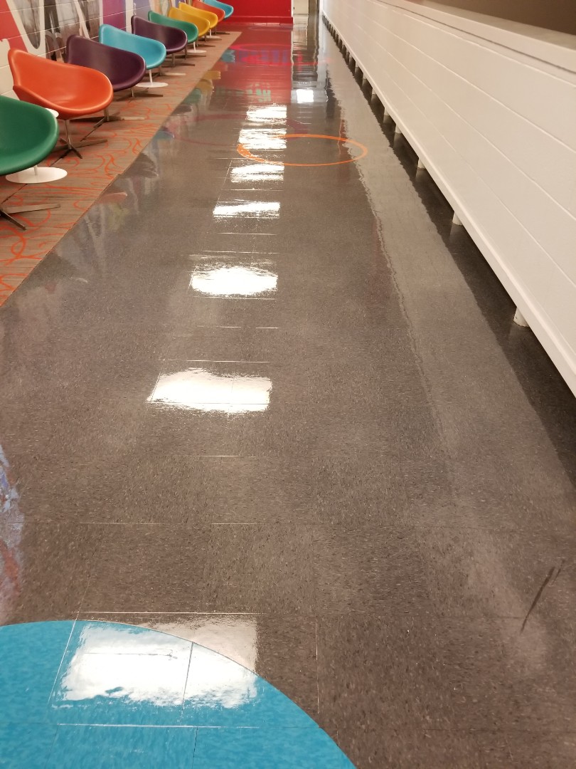 Janitorial floor maintenance looking like glass Janitorial floor maintenance looking like glass