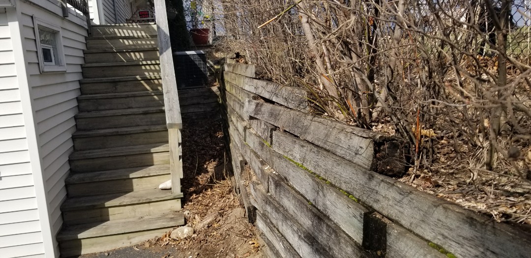 Burlington, WI - Just meet with a client who is in need of their timber retaining wall replaced. This failing timber wall will be replaced with Rochester Concrete Products (RCP) Classic 8" Retaining wall block. Burlington, WI - Just meet with a client who is in need of their timber retaining wall replaced. This failing timber wall will be replaced with Rochester Concrete Products (RCP) Classic 8" Retaining wall block.