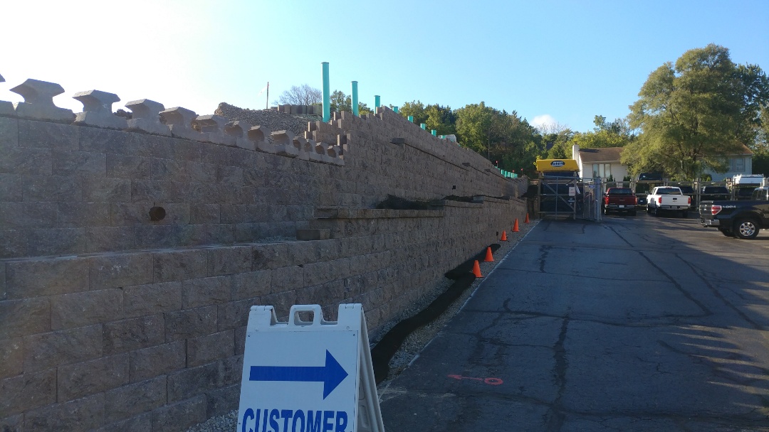 Waukesha, WI - Finished this 10,000 sf Rockwood Chisel Face 8" retaining wall for The Redmond Company in Waukesha WI. One of the largest retaining wall projects in the area Waukesha, WI - Finished this 10,000 sf Rockwood Chisel Face 8" retaining wall for The Redmond Company in Waukesha WI. One of the largest retaining wall projects in the area