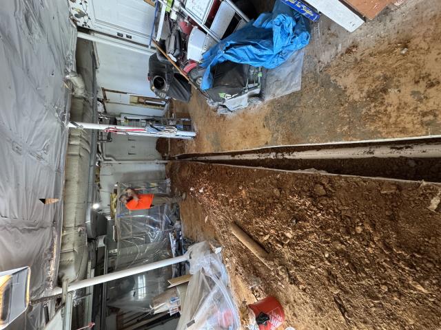 I replaced a broken cast-iron sewer line in a basement using a partial repipe process. I cut and removed sections of concrete to access the pipe and replaced it with PVC piping. After the new pipe was installed, I re-poured the concrete to restore the basement floor.