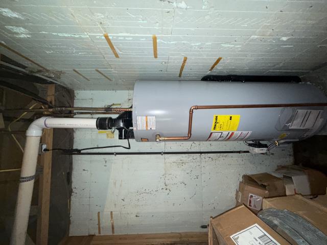 Upon arrival at the property, our technician met with the customer, who directed us to the failing water heater. A thorough inspection revealed significant leakage through the gas igniter and down to the base of the unit, confirming that the water heater had failed completely and required replacement. After discussing options with the homeowner, it was agreed to proceed with a direct swap installation.

The appropriate replacement water heater and necessary materials were retrieved, and the removal process began. The existing water heater was safely disconnected and removed. The new water heater was then set in place and installed, with the water lines reconnected using ProPress couplings to ensure a secure and reliable seal. The gas supply line was properly reconnected, and the venting system was rerouted to accommodate the new unit’s slightly different vent discharge location.

Once all connections were made, the water supply was restored, and the system was tested thoroughly. Al