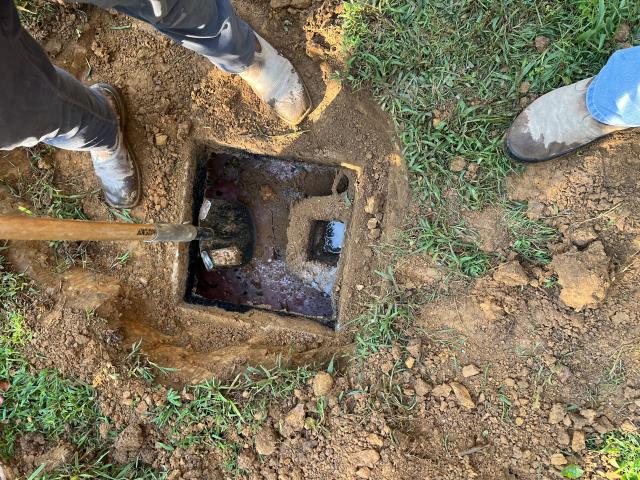 I was called to inspect a septic tank that had not been pumped in over 15 years. Upon inspection, I observed significant grease buildup on both sides of the tank. The tank had only been pumped twice, once approximately 15 years ago and again about 3 years ago. At the homeowner's request, I left the tank exposed but put the septic lids back on.