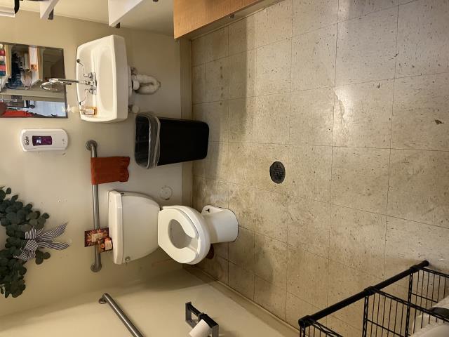 Upon arrival, our technician was greeted by the store manager, who led us to the restrooms experiencing issues. Upon entering the men’s bathroom, our technician immediately noted dried sewage on the floor and a strong septic odor.
Further investigation led to the clean-out located behind the toilet, which was accessed by removing the wall cover and clean-out cap. The technician then ran the inspection camera, which became fully submerged in standing water within 8 feet. Continuing the inspection, an obstruction was encountered approximately 25 feet downstream.
The camera was removed, and our technician proceeded to snake the drain line. Snaking the line revealed a blockage caused by feminine hygiene products. Once cleared, both toilets were tested and confirmed to be flushing and functioning at 100%.
A follow-up camera inspection confirmed that, while both fixtures were operating properly, standing water remained in the line. The camera again became fully submerged with limited visi