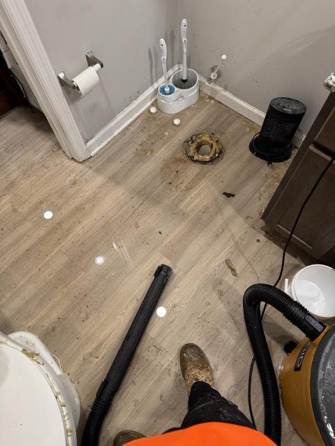 When we arrived on site, we noticed water and solids were overflowing from the toilet and the shower. We carefully tried to clean water up with Crawltec as we removed the toilet. They continuously vacuumed water all over the floor and from toilet flange. We ran a snake and were finally able to clear the clog. Washed out shower and got rid of solids and water. Ran a snake and removed toilet.