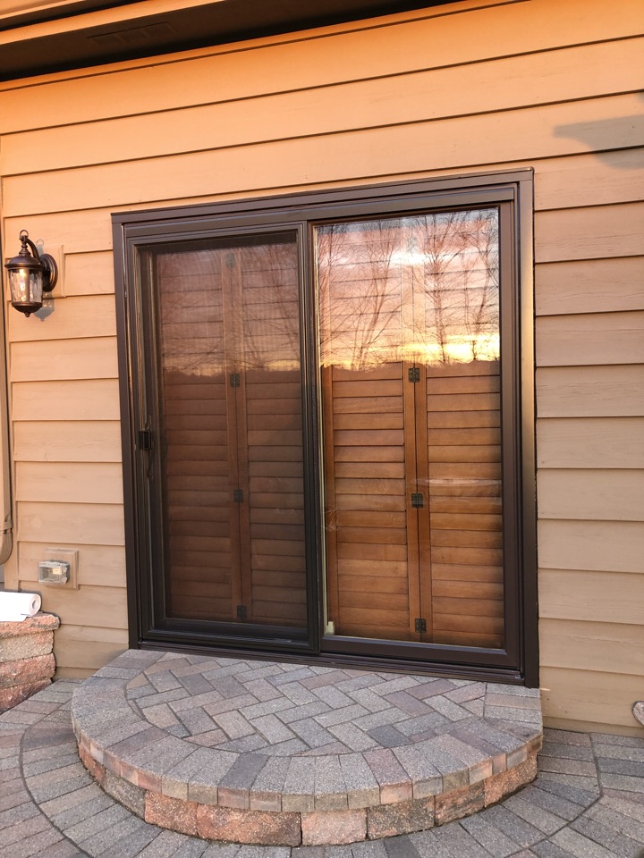 Algonquin, IL - Marvin integrity sliding door with bronze roll form cladding Algonquin, IL - Marvin integrity sliding door with bronze roll form cladding