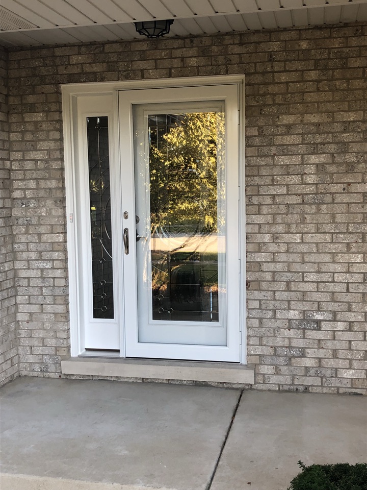 Mokena, IL - Albany entry door with sidelights and a provia storm door Mokena, IL - Albany entry door with sidelights and a provia storm door