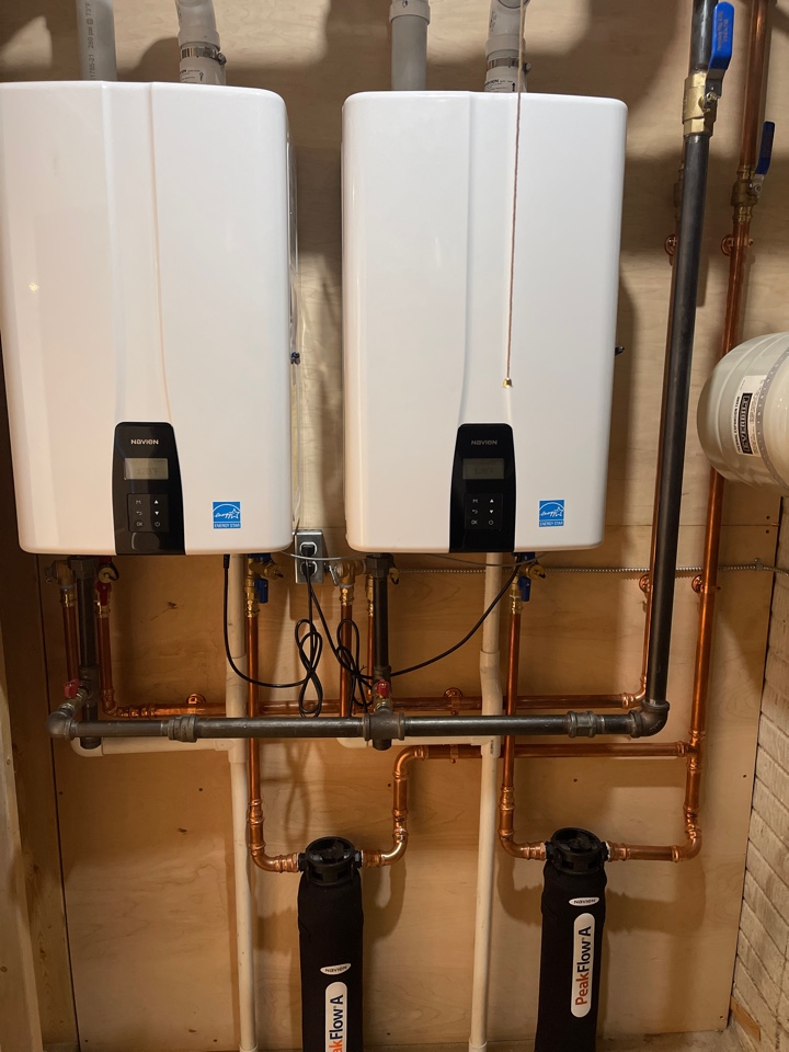 Replaced Bradford White power vent water heaters with 2 Navien tankless water heaters.