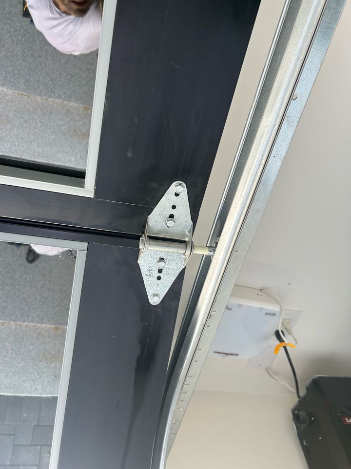 Installing rollers to make the door safe and quiet 