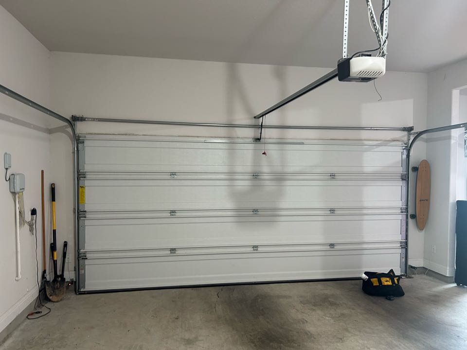 Spring conversion on 16x7 Wayne Dalton. Notice the outside dual springs. This is the best setup 