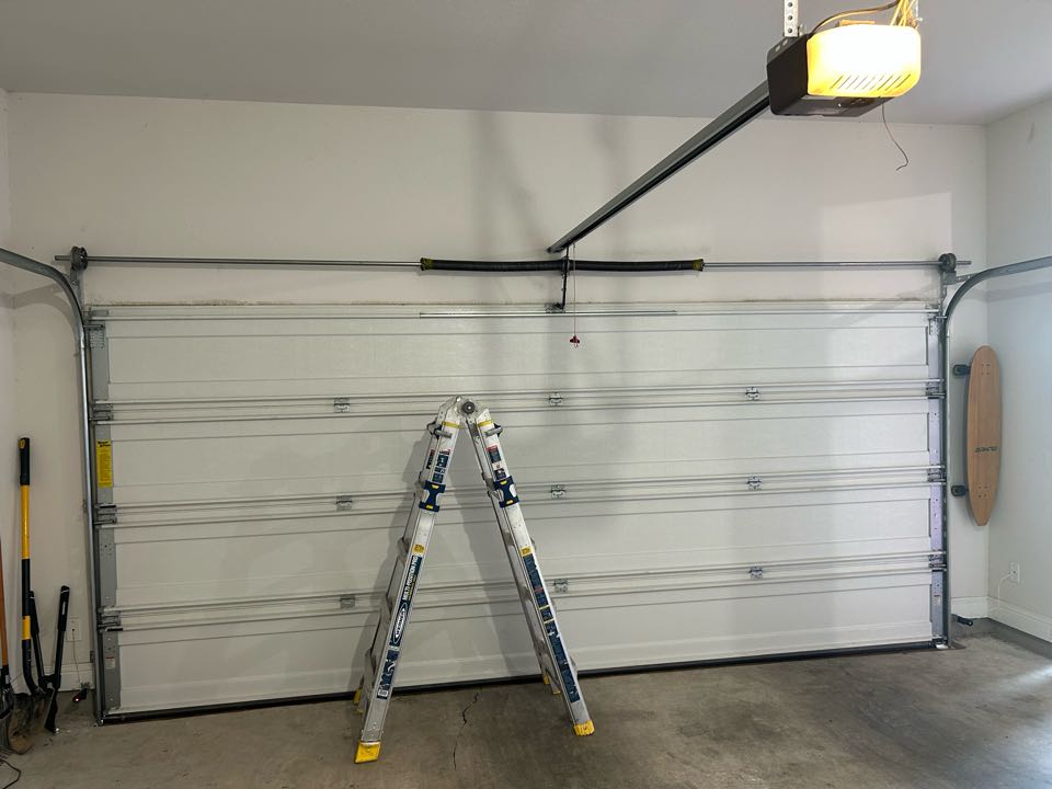 Spring conversion on 16x7 Wayne Dalton. Notice the outside dual springs. This is the best setup 