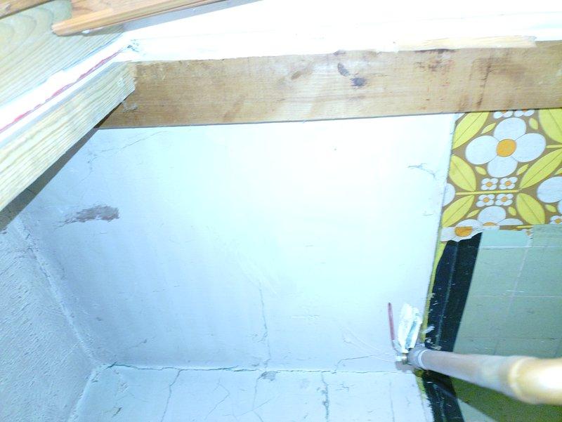 Performed diagnostics on non-lighting hot water tank. Verified proper gas flow, cleaned pilot assembly and ignition components. Successfully re-lit pilot and confirmed stable flame, restoring hot water functionality. Noted significant wall deterioration around plumbing connections that should be addressed in future service.