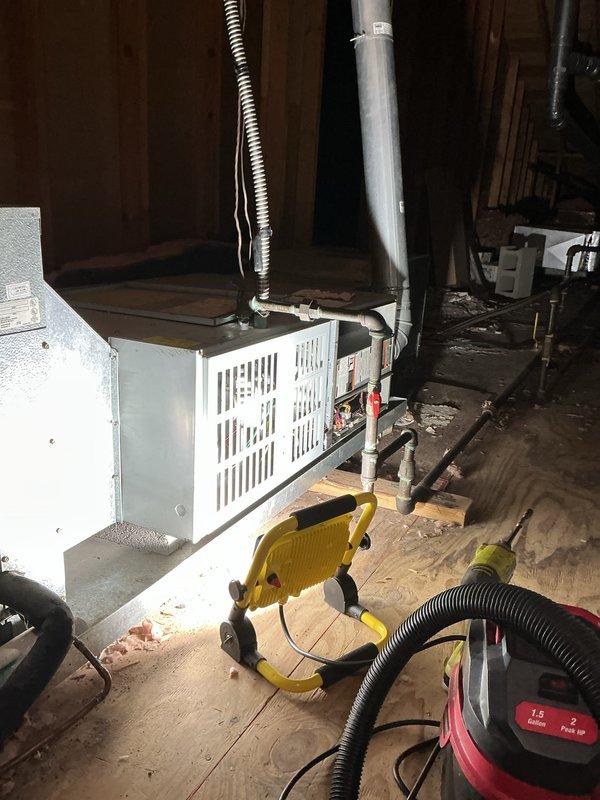 Performed scheduled heating maintenance service in attic location. Inspected gas furnace system, tested system temperature (55.0°F), and replaced air filter as requested by customer. All components functioning within normal parameters.